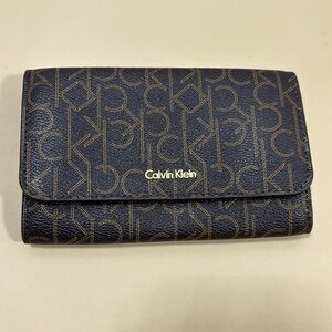 Calvin Klein Brown and tan signature wallet​​​​​​​​